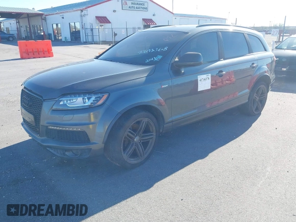 2013 Audi Q7 3.0T S line Prestige with VIN WA1DGAFE6DD009137, listed as a IAAI auction lot 41744378 with 99,060 mi miles. Bid and sale history available at carsss.com. Image 2.