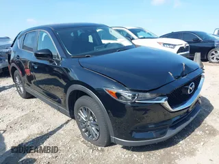 2017 Mazda CX-5 Touring z VIN JM3KFBCL0H0209458, wystawiony jako IAAI lot #42169599 z przebiegiem 93 287 mil mil oraz . Historia ofert i sprzedaży dostępna na DreamBid. Obrazek 1.