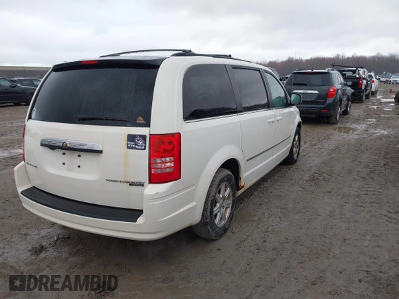 2010 Chrysler Town & Country Touring with VIN 2A4RR5D19AR441155, listed as a IAAI auction lot 41848553 with 197,088 mi miles. Bid and sale history available at carsss.com. Image 4.