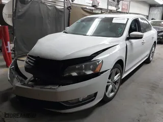 2013 Volkswagen Passat TDI SEL Premium with VIN 1VWCN7A39DC011421, listed as a IAAI auction lot 42042189 with 141,670 mi miles. Bid and sale history available at carsss.com. Image 2.