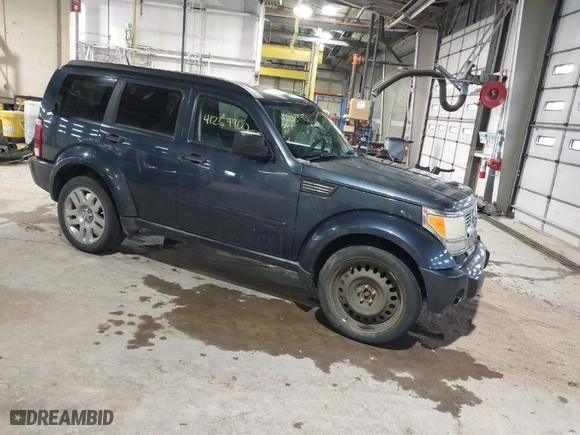 2008 Dodge Nitro SLT with VIN 1D8GU58K68W223532, listed as a IAAI auction lot 41259900 with 156,956 mi miles. Bid and sale history available at carsss.com. Image 1.