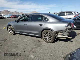 2014 Volkswagen Passat Wolfsburg Edition with VIN 1VWAT7A34EC082377, listed as a Copart auction lot 52820235 with 196,901 mi miles and Salvage title. Bid and sale history available at DreamBid. Image 2.