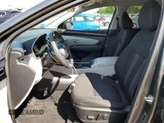 2023 Hyundai Tucson SEL with VIN 5NMJBCAEXPH209637, listed as a Copart auction lot 63222495 with 62,009 mi miles and Clean title. Bid and sale history available at DreamBid. Image 7.