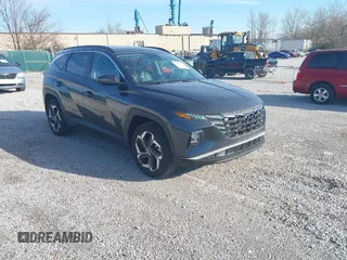 2022 Hyundai Tucson SEL z VIN 5NMJCCAE6NH064395, wystawiony jako IAAI lot #41874438 z przebiegiem 30 798 mil mil oraz . Historia ofert i sprzedaży dostępna na DreamBid. Obrazek 1.