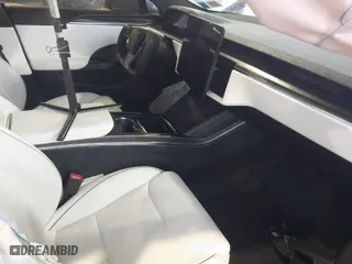 2022 Tesla Model S Plaid with VIN 5YJSA1E64NF477855, listed as a IAAI auction lot 41470591 with 1 mi miles. Bid and sale history available at carsss.com. Image 5.