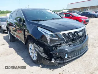 2021 Cadillac XT5 FWD Luxury with VIN 1GYKNAR40MZ231577, listed as a IAAI auction lot 42565301 with 48,321 mi miles and . Bid and sale history available at DreamBid. Image 1.