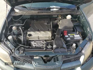 2004 Mitsubishi Outlander LS with VIN JA4LX31F54U049765, listed as a Copart auction lot 62441514 with 211,231 mi miles and Salvage Title. Bid and sale history available at carsss.com. Image 13.