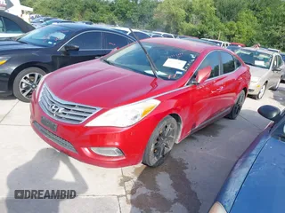 2013 Hyundai Azera z VIN KMHFG4JG4DA253875, wystawiony jako IAAI lot #42773889 z przebiegiem 188 528 mil mil oraz . Historia ofert i sprzedaży dostępna na DreamBid. Obrazek 2.