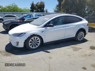 2019 Tesla Model X 75D with VIN 5YJXCAE21KF160589, listed as a Copart auction lot 50985585 with 31,273 mi miles and Salvage Title. Bid and sale history available at carsss.com. Image 1.