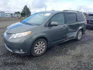 2011 Toyota Sienna XLE with VIN 5TDDK3DCXBS003666, listed as a IAAI auction lot 41807992 with 156,699 mi miles. Bid and sale history available at carsss.com. Image 2.