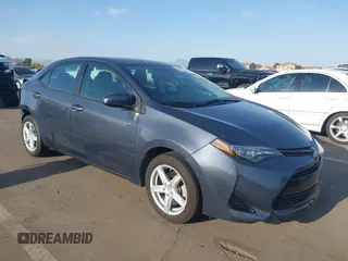 2018 Toyota Corolla L with VIN 5YFBURHEXJP806632, listed as a IAAI auction lot 41933984 with 70,091 mi miles and . Bid and sale history available at DreamBid. Image 1.