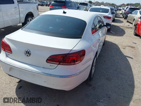 2013 Volkswagen CC Sport with VIN WVWBN7AN5DE503125, listed as a IAAI auction lot 41581088 with 128,964 mi miles and . Bid and sale history available at DreamBid. Image 4.
