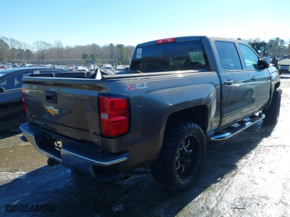 2015 Chevrolet Silverado 1500 LT with VIN 3GCUKREC9FG517787, listed as a IAAI auction lot 41400803 with 254,489 mi miles. Bid and sale history available at carsss.com. Image 4.