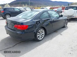 2011 BMW 3 Series 328i xDrive with VIN WBAKF5C55BE586564, listed as a IAAI auction lot 41944192 with 153,167 mi miles. Bid and sale history available at carsss.com. Image 4.