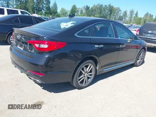 2015 Hyundai Sonata Sport z VIN 5NPE34AB5FH198560, wystawiony jako IAAI lot #42467031 z przebiegiem 96 111 mil mil oraz . Historia ofert i sprzedaży dostępna na DreamBid. Obrazek 4.