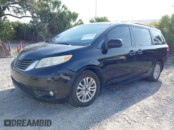 2011 Toyota Sienna XLE AAS with VIN 5TDYK3DC7BS051241, listed as a IAAI auction lot 42214806 with 253,860 mi miles and . Bid and sale history available at DreamBid. Image 2.