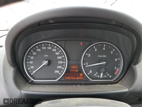 2009 BMW 1 Series 128i with VIN WBAUL73569VJ76363, listed as a Copart auction lot 52380635 with 210,519 mi miles and Salvage Title. Bid and sale history available at DreamBid. Image 9.