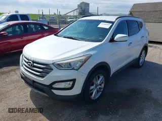 2013 Hyundai Santa Fe Sport z VIN 5XYZU3LA5DG045646, wystawiony jako IAAI lot #42380560 z przebiegiem 131 944 mil mil oraz . Historia ofert i sprzedaży dostępna na DreamBid. Obrazek 2.
