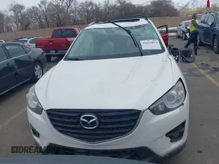 2016 Mazda CX-5 Grand Touring z VIN JM3KE2DY8G0885006, wystawiony jako IAAI lot #41615873 z przebiegiem 118 890 mil mil oraz . Historia ofert i sprzedaży dostępna na DreamBid. Obrazek 12.