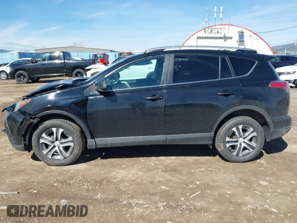 2017 Toyota RAV4 LE with VIN 2T3BFREV2HW543163, listed as a IAAI auction lot 41875755 with 96,398 mi miles and . Bid and sale history available at carsss.com. Image 14.