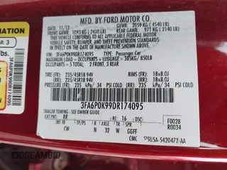 2013 Ford Fusion Titanium with VIN 3FA6P0K99DR174095, listed as a IAAI auction lot 42037806 with 81,514 mi miles. Bid and sale history available at carsss.com. Image 9.