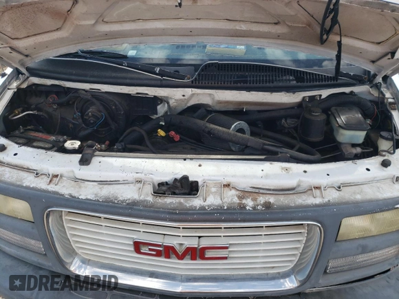 2000 GMC Savana z VIN 1GDFG15RXY1219889, wystawiony jako Copart lot #76055684 z przebiegiem 129 427 mil mil oraz Szkoda całkowita • Salvage title. Historia ofert i sprzedaży dostępna na DreamBid. Obrazek 12.