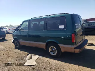 2001 GMC Safari with VIN 1GKDM19W71B511332, listed as a Copart auction lot 56097624 with 124,493 mi miles and Salvage Title. Bid and sale history available at carsss.com. Image 2.