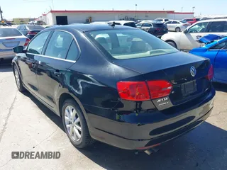 2014 Volkswagen Jetta Sedan SE w/Connectivity with VIN 3VWD07AJ5EM382352, listed as a IAAI auction lot 41722041 with 222,806 mi miles. Bid and sale history available at carsss.com. Image 3.