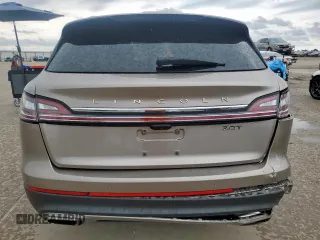 2020 Lincoln Nautilus Standard z VIN 2LMPJ6J91LBL15534, wystawiony jako Copart lot #57976835 z przebiegiem 32 572 mil mil oraz Szkoda całkowita • Salvage title. Historia ofert i sprzedaży dostępna na DreamBid. Obrazek 6.
