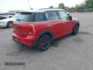2013 MINI Countryman S with VIN WMWZC3C57DWP21892, listed as a IAAI auction lot 42402600 with 59,700 mi miles and . Bid and sale history available at DreamBid. Image 4.