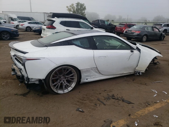 2018 Lexus LC 500h z VIN JTHHP5AY9JA000511, wystawiony jako Copart lot #72041014 z przebiegiem Nie podano mil oraz Szkoda całkowita • Salvage title. Historia ofert i sprzedaży dostępna na DreamBid. Obrazek 3.