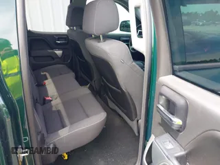 2014 Chevrolet Silverado 1500 LT with VIN 1GCRCREH2EZ323115, listed as a IAAI auction lot 42055949 with 61,337 mi miles and . Bid and sale history available at DreamBid. Image 8.