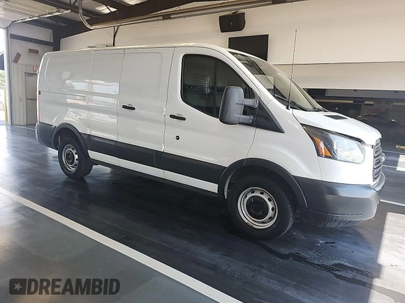 2016 Ford Transit Cargo with VIN 1FTYE1ZM0GKB06690, listed as a IAAI auction lot 42677893 with 295,974 mi miles and . Bid and sale history available at DreamBid. Image 17.