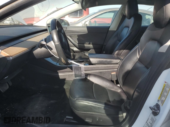 2019 Tesla Model 3 Mid Range with VIN 5YJ3E1EA3KF425125, listed as a Copart auction lot 82681864 with 105,345 mi miles and Salvage Title. Bid and sale history available at DreamBid. Image 7.