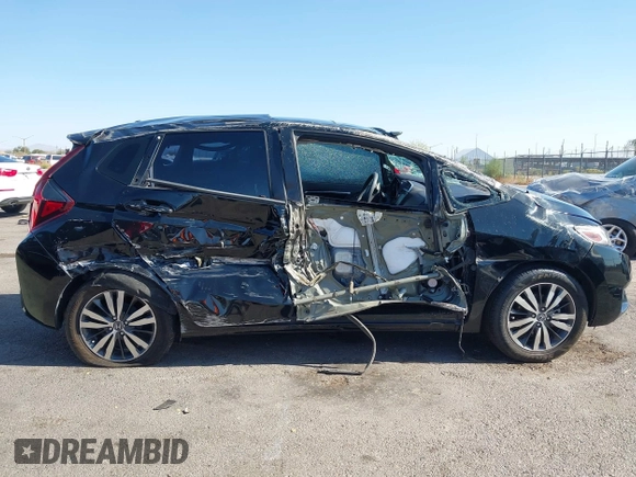 2015 Honda Fit EX-L z VIN 3HGGK5H81FM705199, wystawiony jako IAAI lot #42310099 z przebiegiem Nie podano mil oraz . Historia ofert i sprzedaży dostępna na DreamBid. Obrazek 13.