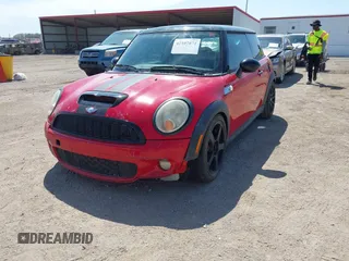2010 MINI Hardtop S with VIN WMWMF7C51ATX43277, listed as a IAAI auction lot 42107871 with 102,886 mi miles and . Bid and sale history available at DreamBid. Image 2.