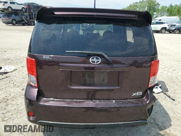 2014 Scion xB z VIN JTLZE4FE2EJ053923, wystawiony jako Copart lot #54121165 z przebiegiem Nie podano mil oraz Szkoda całkowita • Salvage title. Historia ofert i sprzedaży dostępna na DreamBid. Obrazek 6.