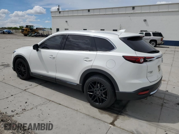 2016 Mazda CX-9 Signature with VIN JM3TCBEY7G0118322, listed as a Copart auction lot 54826655 with 123,618 mi miles and Salvage title. Bid and sale history available at DreamBid. Image 2.