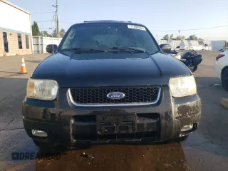 2001 Ford Escape XLT with VIN 1FMCU04141KB40767, listed as a Copart auction lot 71492664 with 118,541 mi miles and Salvage Title. Bid and sale history available at carsss.com. Image 5.