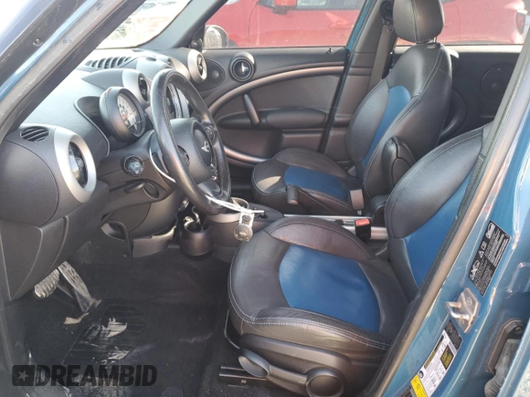 2011 MINI Countryman S with VIN WMWZC5C57BWL53481, listed as a Copart auction lot 46855785 with 99,849 mi miles and Salvage Title. Bid and sale history available at DreamBid. Image 7.