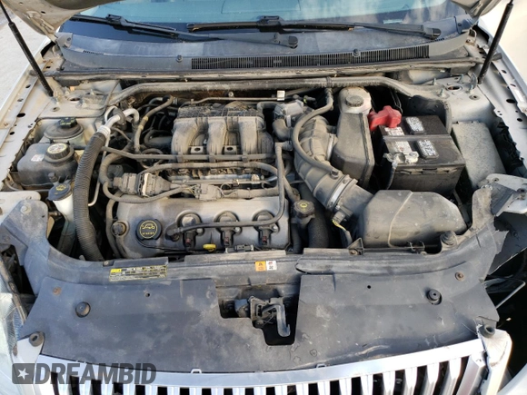 2008 Mercury Sable Premier z VIN 1MEHM42W38G600870, wystawiony jako Copart lot #50564345 z przebiegiem 211 414 mil mil oraz Nie do naprawy • Non repairable. Historia ofert i sprzedaży dostępna na DreamBid. Obrazek 11.