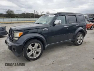 2011 Dodge Nitro Heat with VIN 1D4PU4GKXBW604983, listed as a Copart auction lot 80203524 with 141,705 mi miles and Salvage Title. Bid and sale history available at carsss.com. Image 1.