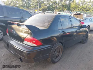 2003 Mitsubishi Lancer ES with VIN JA3AJ26EX3U015276, listed as a IAAI auction lot 37806582 with 181,069 mi miles. Bid and sale history available at carsss.com. Image 4.