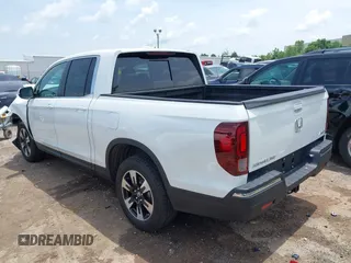 2020 Honda Ridgeline RTL with VIN 5FPYK3F51LB029859, listed as a IAAI auction lot 42462285 with 57,399 mi miles and . Bid and sale history available at DreamBid. Image 3.