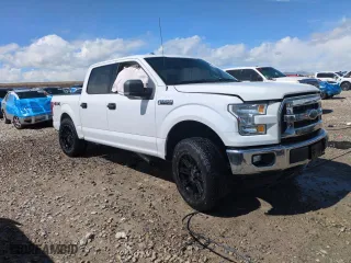 2015 Ford F-150 XLT with VIN 1FTEW1EF5FFB17148, listed as a Copart auction lot 51265215 with 128,011 mi miles and Salvage Title. Bid and sale history available at carsss.com. Image 4.