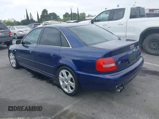 2000 Audi S4 z VIN WAUDD68D2YA041149, wystawiony jako IAAI lot #42192189 z przebiegiem 145 417 mil mil oraz . Historia ofert i sprzedaży dostępna na DreamBid. Obrazek 3.