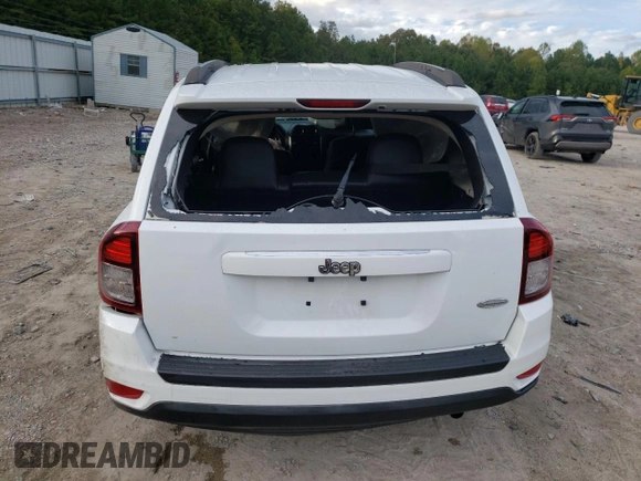 2015 Jeep Compass Latitude with VIN 1C4NJCEB9FD264284, listed as a Copart auction lot 76277334 with 104,275 mi miles and Salvage Title. Bid and sale history available at carsss.com. Image 6.