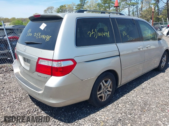 2005 Honda Odyssey EX-L with VIN 5FNRL38695B425315, listed as a IAAI auction lot 42175154 with Not provided miles and . Bid and sale history available at DreamBid. Image 4.