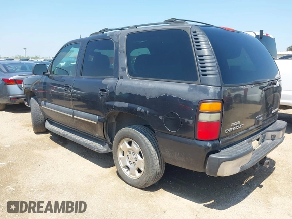 2004 Chevrolet Tahoe LS with VIN 1GNEC13T04R156427, listed as a IAAI auction lot 42333312 with 303,040 mi miles and . Bid and sale history available at DreamBid. Image 3.