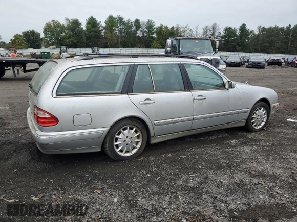 2000 Mercedes-Benz E-Class AWD with VIN WDBJH82J6YX039226, listed as a Copart auction lot 72559034 with 213,680 mi miles and Clean Title. Bid and sale history available at carsss.com. Image 3.